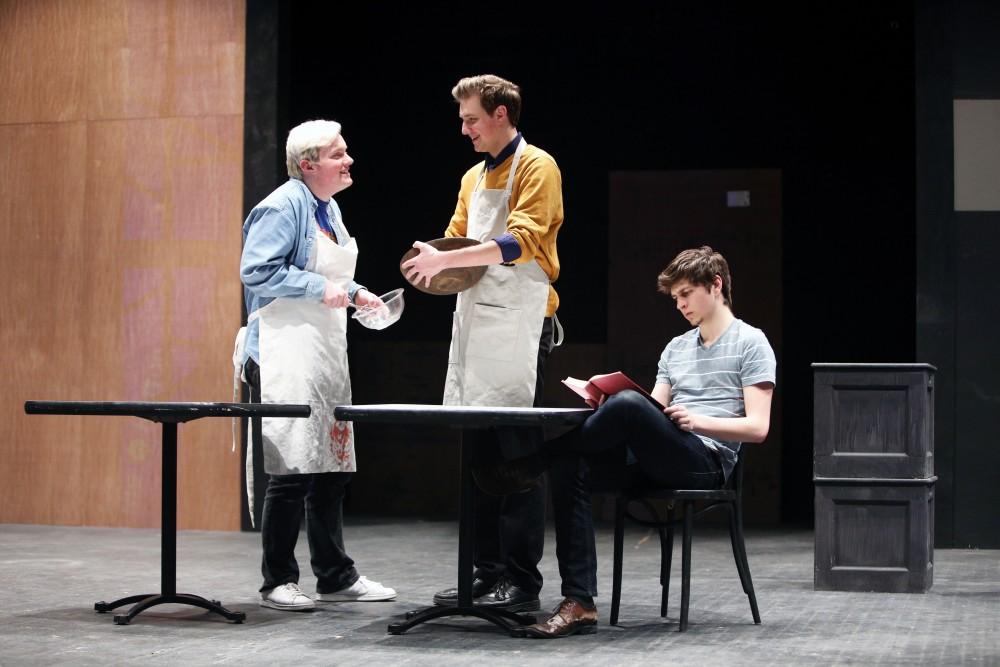 GVL / Emily Frye 
(From left to right) Liam Purtle, David VanAlstyne and Jacob Molli, from the upcoming play "Six Characters Theater Performance", rehearse a scene on Thursday Mar. 24, 2016. 