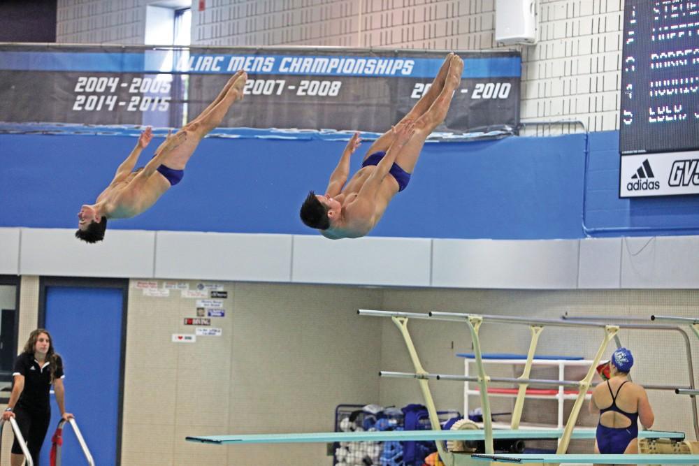 GVL / Emily FryeFreshman Brad Dalrymple (right) competes against his teammate during the interclub meet on Oct. 10, 2015. Dalrymple came in first place for the 1 meter dive during Division II Nationals this past weekend. 