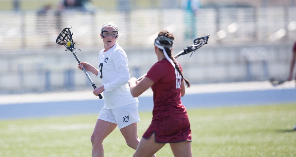 GVL / Kevin Sielaff – Erika Neumen (3) circles the top of Indianapolis' zone and looks to pass the ball. The Lakers defeat the Greyhounds of the University of Indianapolis Saturday, March 26, 2016 with a final score of 15-4.