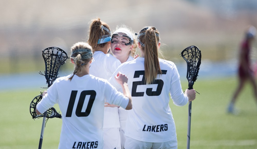 GVL / Kevin Sielaff – Grand Valley celebrates a goal. The Lakers defeat the Greyhounds of the University of Indianapolis Saturday, March 26, 2016 with a final score of 15-4.