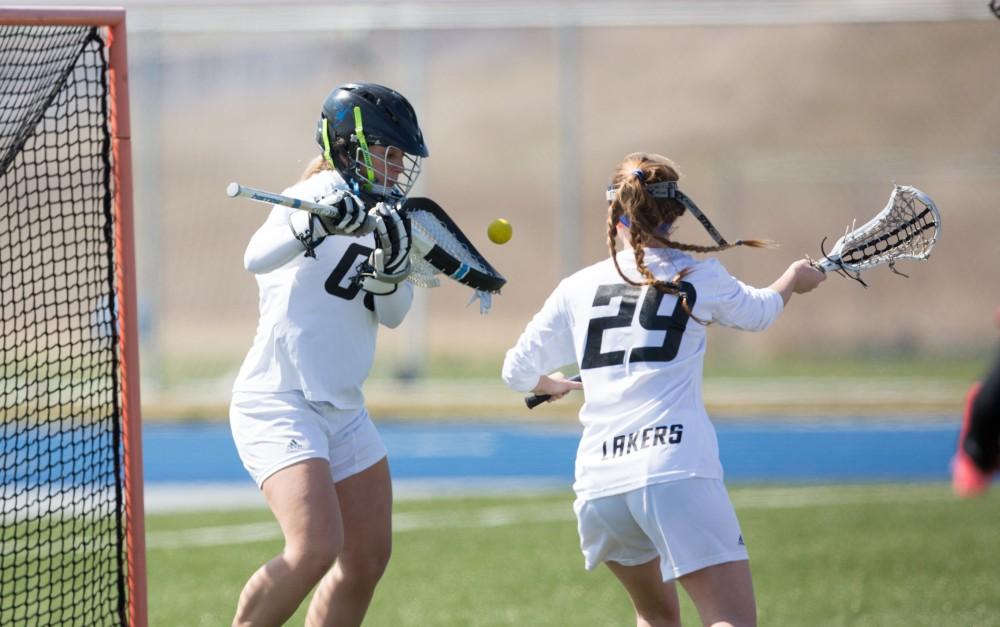 GVL / Kevin Sielaff – Sarah Zwilsky (00) stops a shot on net. The Lakers defeat the Greyhounds of the University of Indianapolis Saturday, March 26, 2016 with a final score of 15-4.