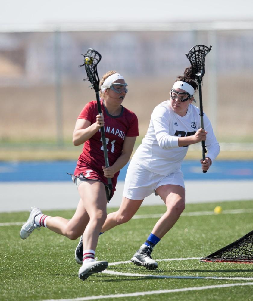 GVL / Kevin Sielaff – Caitlin Wojichowski (33) defends Grand Valley's zone. The Lakers defeat the Greyhounds of the University of Indianapolis Saturday, March 26, 2016 with a final score of 15-4.