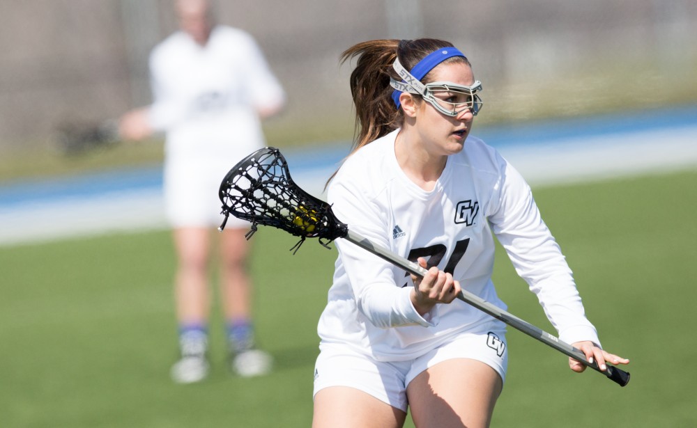 GVL / Kevin Sielaff – Carolina Reis (31) moves the ball up field and into Indianapolis' zone. The Lakers defeat the Greyhounds of the University of Indianapolis Saturday, March 26, 2016 with a final score of 15-4.