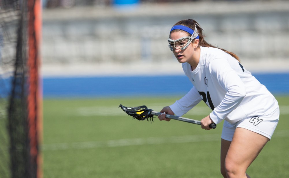 GVL / Kevin Sielaff – Carolina Reis (31) sets up to take a shot on net. The Lakers defeat the Greyhounds of the University of Indianapolis Saturday, March 26, 2016 with a final score of 15-4.