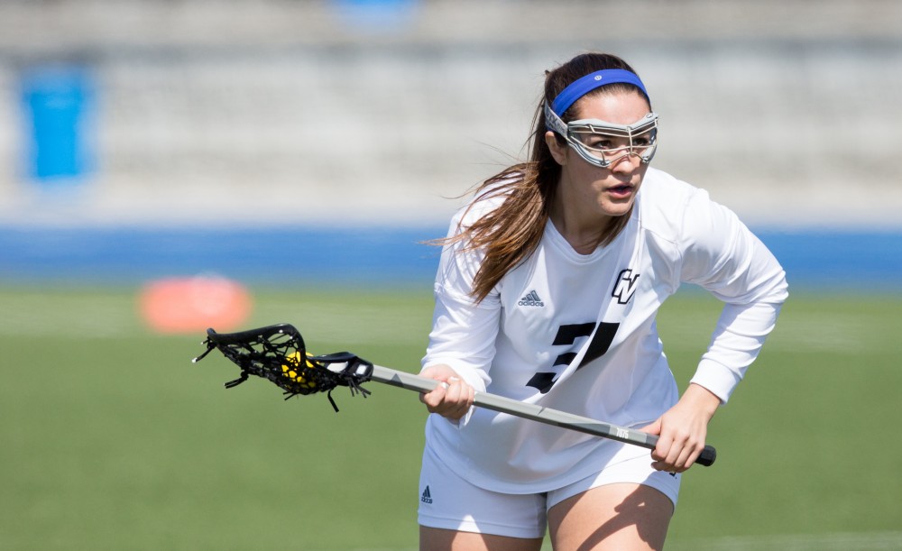 GVL / Kevin Sielaff – Carolina Reis (31) sets up to take a shot on net. The Lakers defeat the Greyhounds of the University of Indianapolis Saturday, March 26, 2016 with a final score of 15-4.