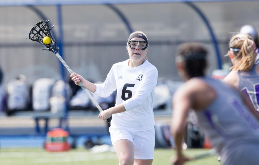 GVL / Kevin Sielaff – Ashley Bailey (6) looks to pass the ball as she runs through McKendree's zone. The Lakers defeat the Bearcats of McKendree University with a final score of 23-11 Friday, March 25, 2016 in Allendale.