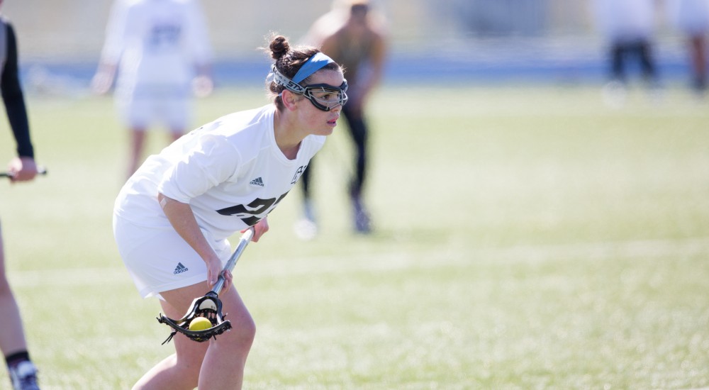 GVL / Kevin Sielaff – Carolyn Kraus (23) prepares to take a shot on McKendree's net. The Lakers defeat the Bearcats of McKendree University with a final score of 23-11 Friday, March 25, 2016 in Allendale.