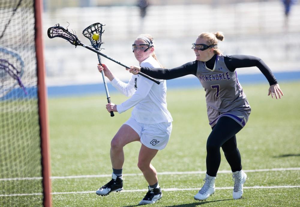 GVL / Kevin Sielaff – Erika Neumen (3) winds up for a shot on net. The Lakers defeat the Bearcats of McKendree University with a final score of 23-11 Friday, March 25, 2016 in Allendale.