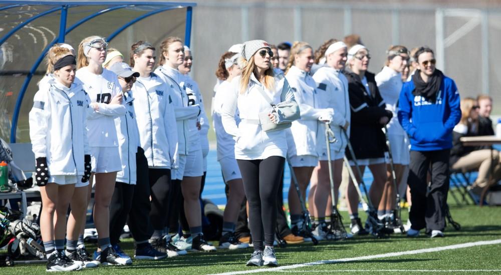 GVL / Kevin Sielaff – Head coach Alicia Groveston looks on toward the play from the bench. The Lakers defeat the Bearcats of McKendree University with a final score of 23-11 Friday, March 25, 2016 in Allendale.