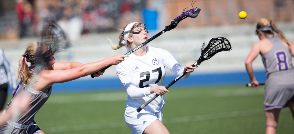 GVL / Kevin Sielaff – Danielle Tunnell (27) tries a shot on net, but it floats high. The Lakers defeat the Bearcats of McKendree University with a final score of 23-11 Friday, March 25, 2016 in Allendale.