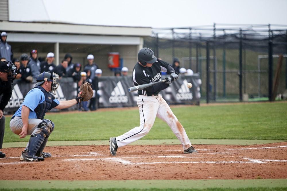 GVL / Emily Frye    
Junior Anthony Villar smacks the ball against Northwood University on Wednesday April 13, 2016.