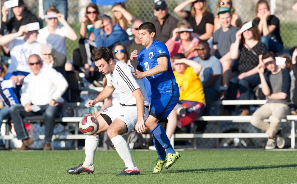 GVL / Kevin Sielaff -  Grand Valley's men's club soccer team falls to GRFC with a final score of 2-0 on Friday, April 15, 2016.