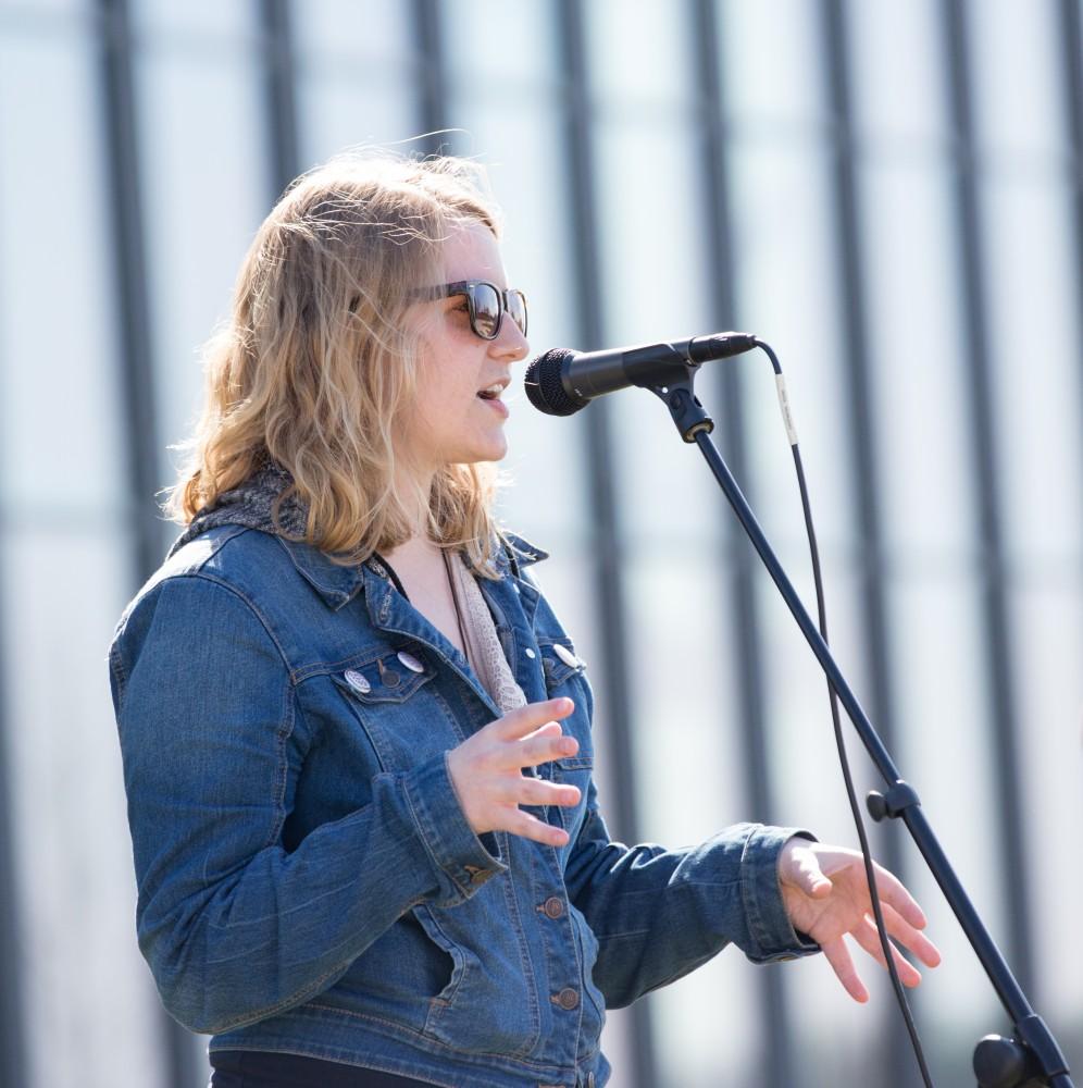 GVL / Kevin Sielaff - Katie Gordon, Program Manager for the Kaufman Interfaith Institute, speaks before the start of the celebration. Grand Valley celebrates India’s spring color festival, Holi, for the first time on Friday, April 15, 2016.