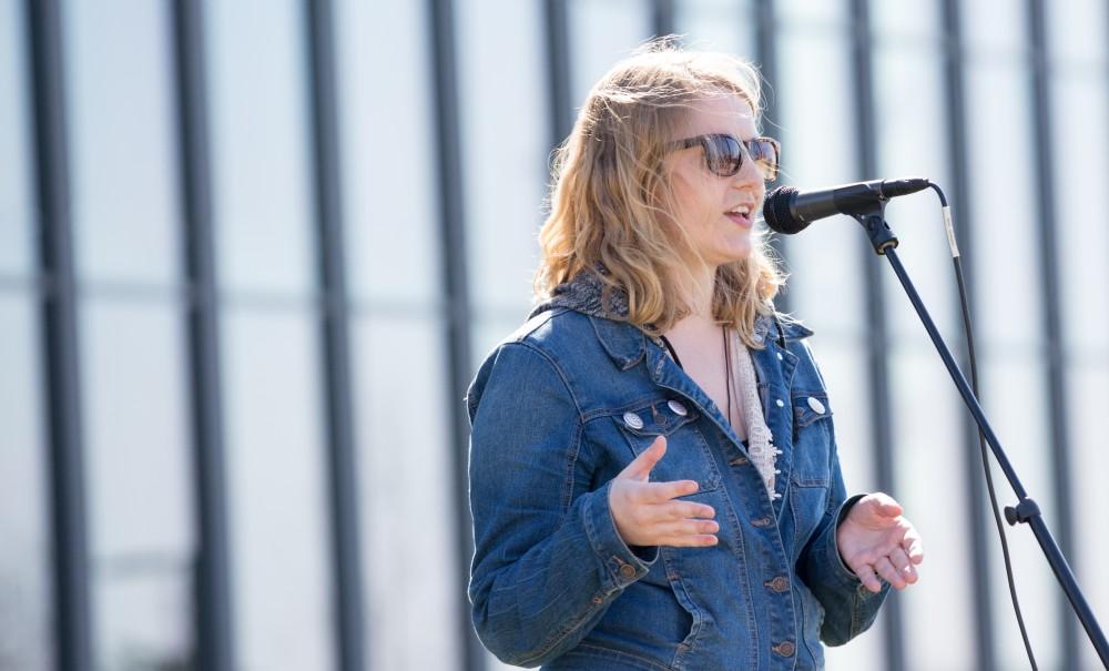 GVL / Kevin Sielaff - Katie Gordon, Program Manager for the Kaufman Interfaith Institute, speaks before the start of the celebration. Grand Valley celebrates India’s spring color festival, Holi, for the first time on Friday, April 15, 2016.