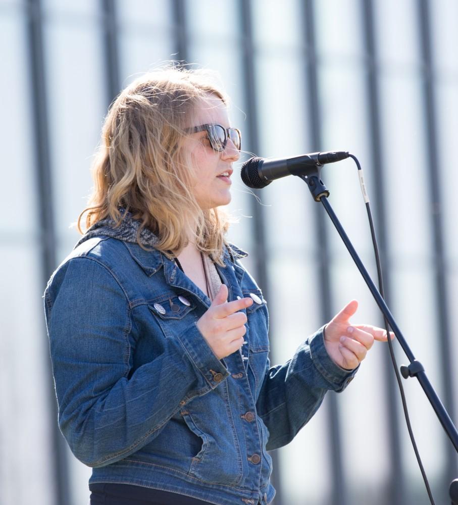 GVL / Kevin Sielaff - Katie Gordon, Program Manager for the Kaufman Interfaith Institute, speaks before the start of the celebration. Grand Valley celebrates India’s spring color festival, Holi, for the first time on Friday, April 15, 2016.