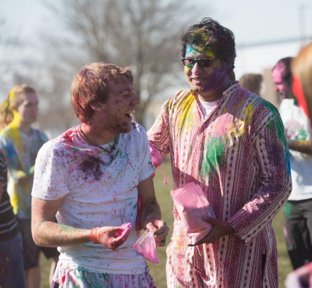 GVL / Kevin Sielaff - Assistant Professor Abhishek Ghosh participates in Holi. Grand Valley celebrates India’s spring color festival, Holi, for the first time on Friday, April 15, 2016.