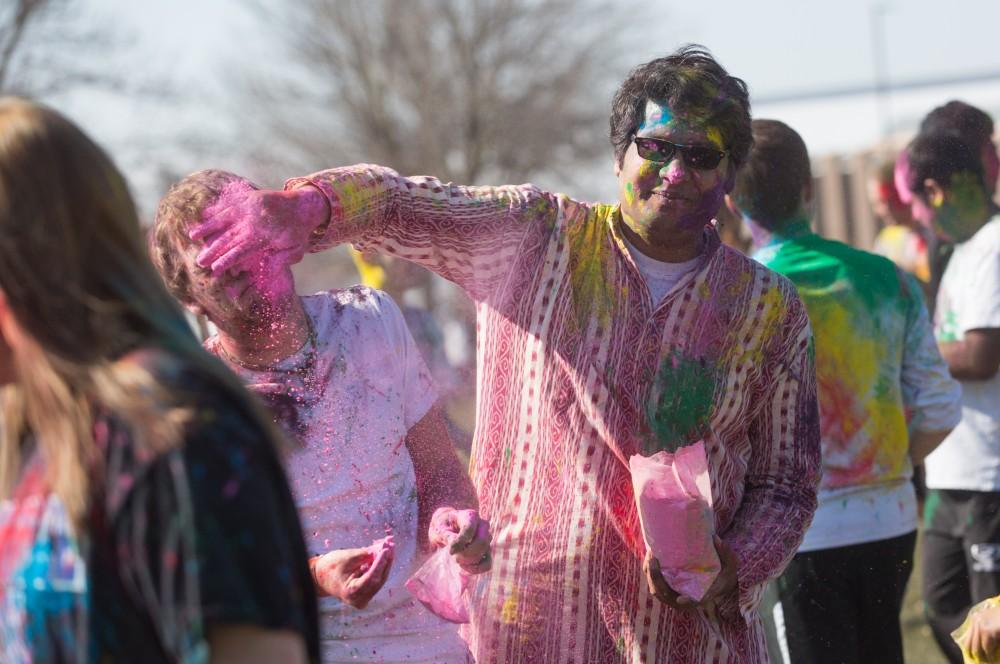 GVL / Kevin Sielaff - Assistant Professor Abhishek Ghosh participates in Holi. Grand Valley celebrates India’s spring color festival, Holi, for the first time on Friday, April 15, 2016.