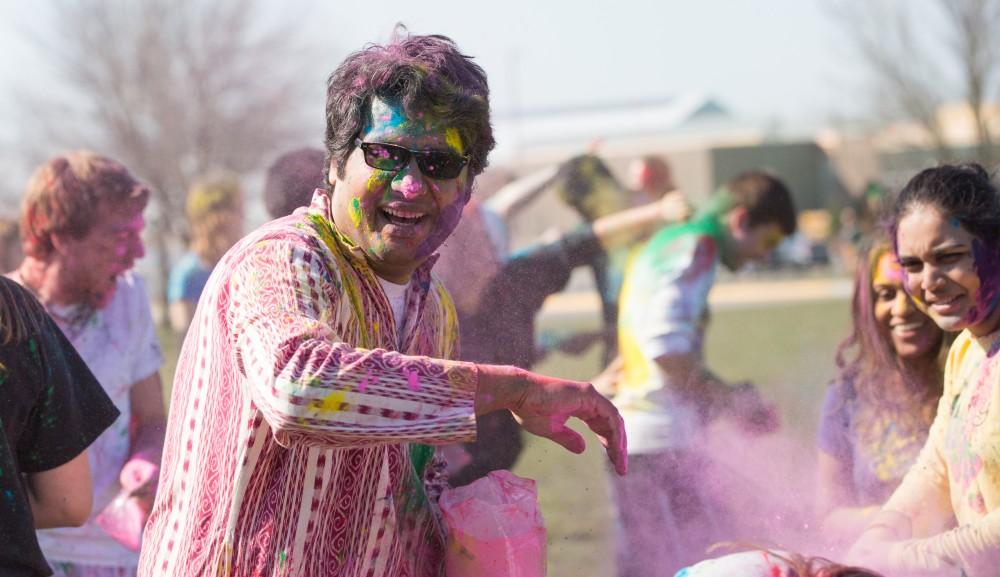 GVL / Kevin Sielaff - Assistant Professor Abhishek Ghosh participates in Holi. Grand Valley celebrates India’s spring color festival, Holi, for the first time on Friday, April 15, 2016.