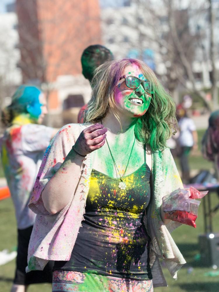 GVL / Kevin Sielaff - Katie Gordon participates in Holi. Grand Valley celebrates India’s spring color festival, Holi, for the first time on Friday, April 15, 2016.