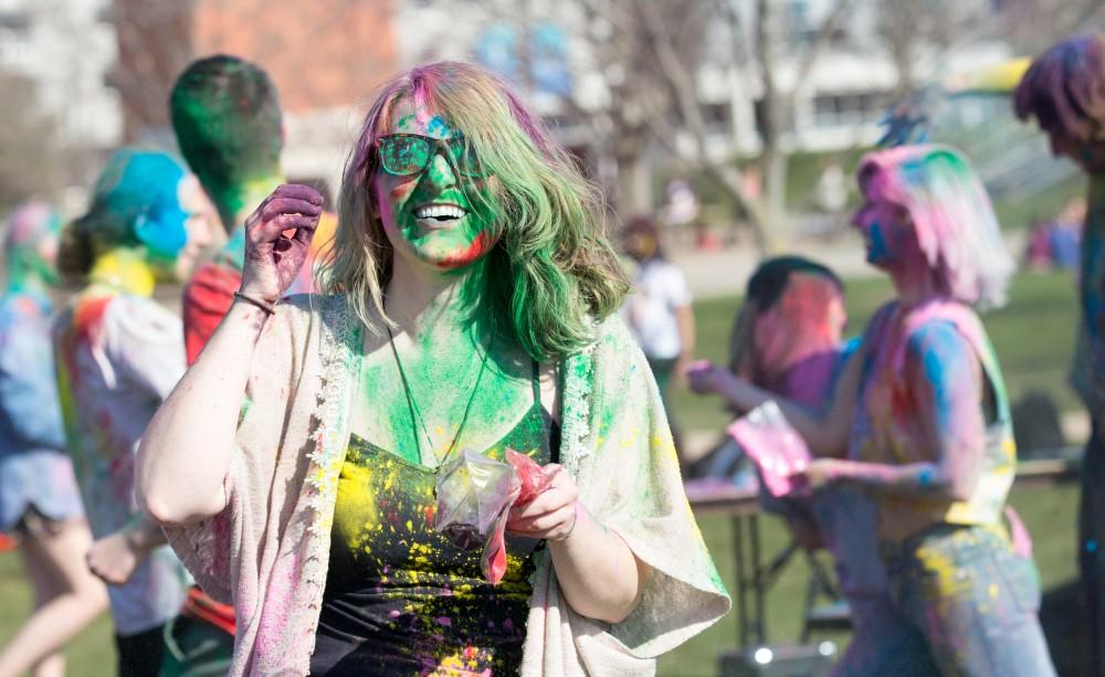 GVL / Kevin Sielaff - Katie Gordon participates in Holi. Grand Valley celebrates India’s spring color festival, Holi, for the first time on Friday, April 15, 2016.