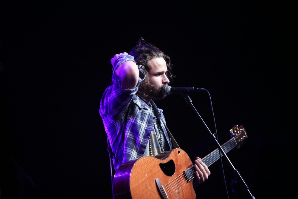 GVL / Emily Frye 
American Country Music singer Joel Crouse hits the stage at Grand Valley State University on Thursday April 7, 2016. 