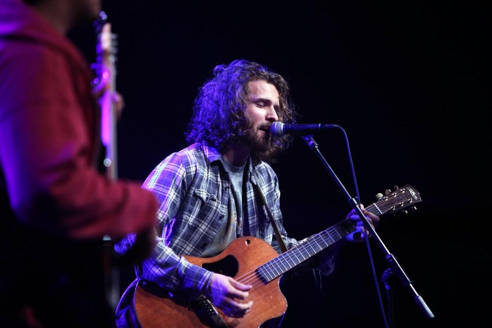 GVL / Emily Frye 
American Country Music singer Joel Crouse hits the stage at Grand Valley State University on Thursday April 7, 2016. 