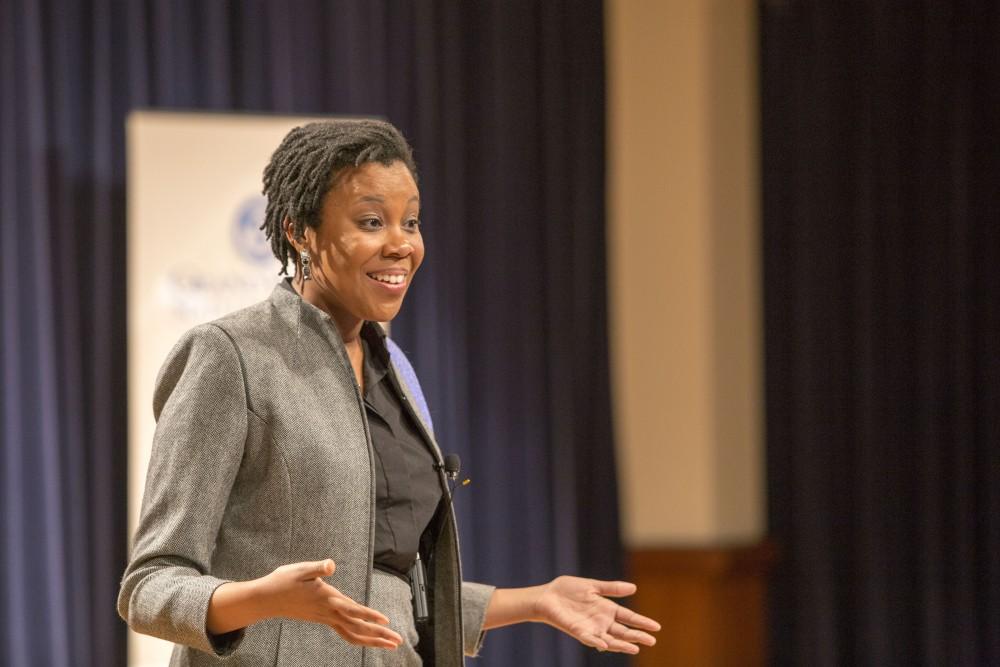 GVL / Sara Carte - Rev. Jennifer Bailey speaks at the Kaufman Interfaith Institute: Sigal Lecture in the Pew Loosemore Auditorium on Wednesday, Mar. 30, 2016.