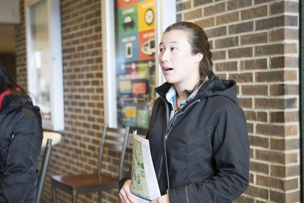 GVL / Sara Carte - Tour guide, Sam tonks, gives high school students a tour of Grand Valley for Laker Experience Day on Friday, Apr. 8, 2016.