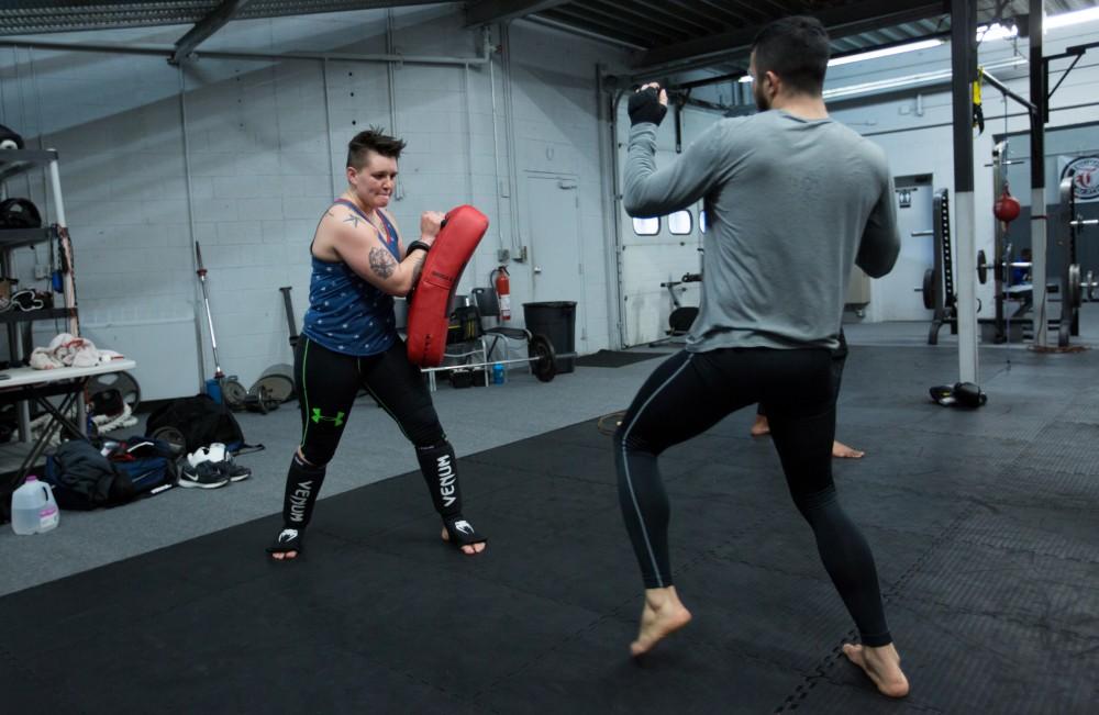 GVL / Kevin Sielaff - Nikita Netjes trains with Santoz Farias at Triumph MMA on Plainfield Ave. in Grand Rapids Tuesday, April 12, 2016.