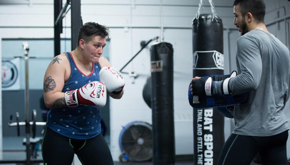 GVL / Kevin Sielaff - Nikita Netjes trains with Santoz Farias at Triumph MMA on Plainfield Ave. in Grand Rapids Tuesday, April 12, 2016.