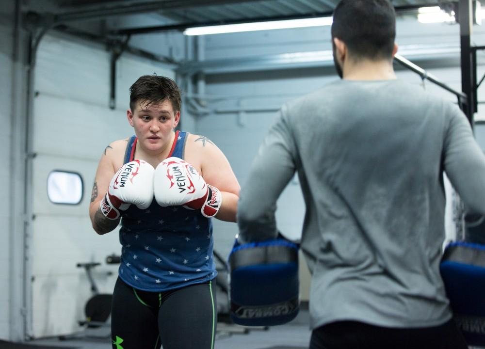 GVL / Kevin Sielaff - Nikita Netjes trains with Santoz Farias at Triumph MMA on Plainfield Ave. in Grand Rapids Tuesday, April 12, 2016.