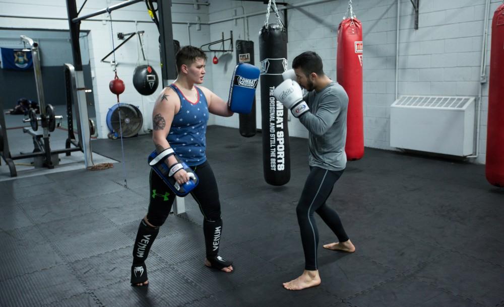 GVL / Kevin Sielaff - Nikita Netjes trains with Santoz Farias at Triumph MMA on Plainfield Ave. in Grand Rapids Tuesday, April 12, 2016.