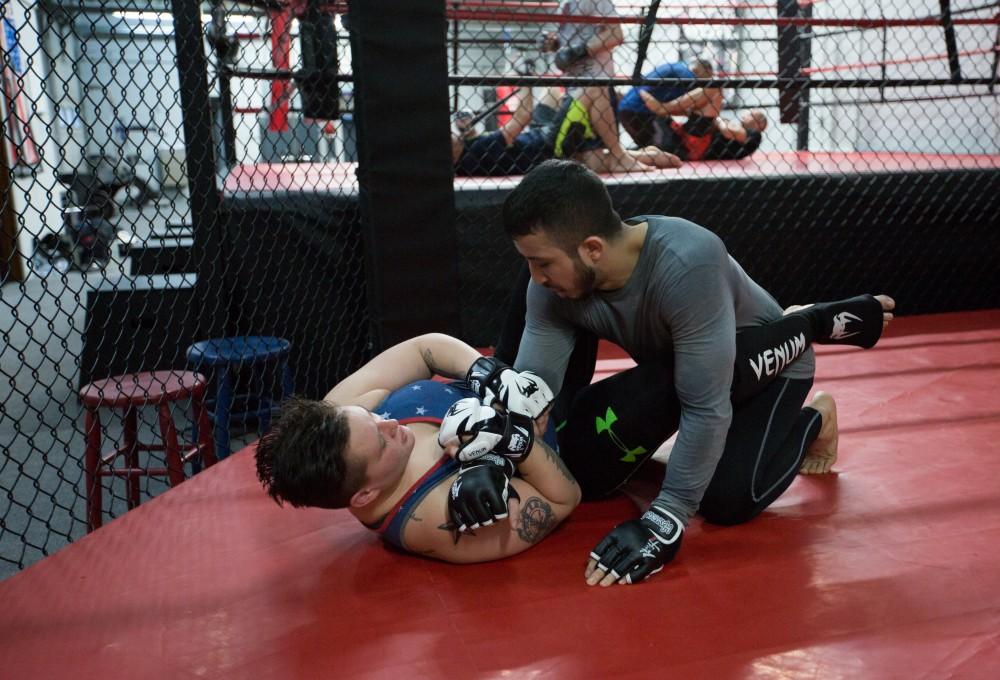 GVL / Kevin Sielaff - Nikita Netjes trains with Santoz Farias at Triumph MMA on Plainfield Ave. in Grand Rapids Tuesday, April 12, 2016.