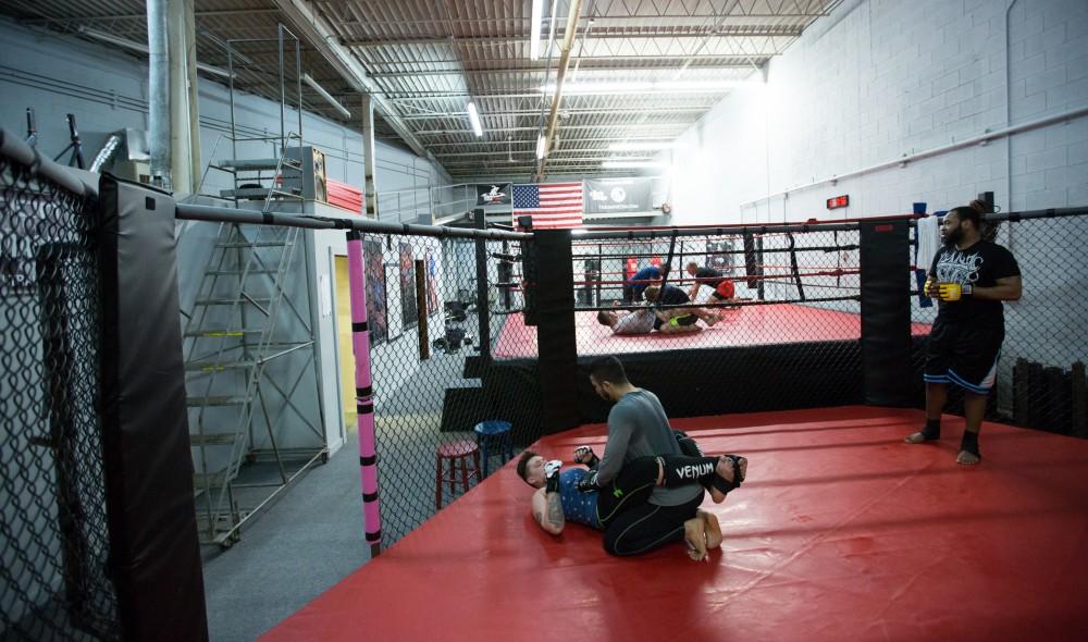 GVL / Kevin Sielaff - Nikita Netjes trains with Santoz Farias at Triumph MMA on Plainfield Ave. in Grand Rapids Tuesday, April 12, 2016.