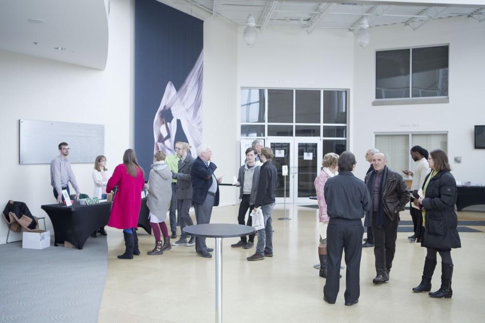 GVL / Sara Carte - People wait for the GVSU New Music Ensemble 10th Anniversary Concert to begin at the Peter Martin Wege Theatre in Grand Rapids on Saturday, Apr. 2, 2016.