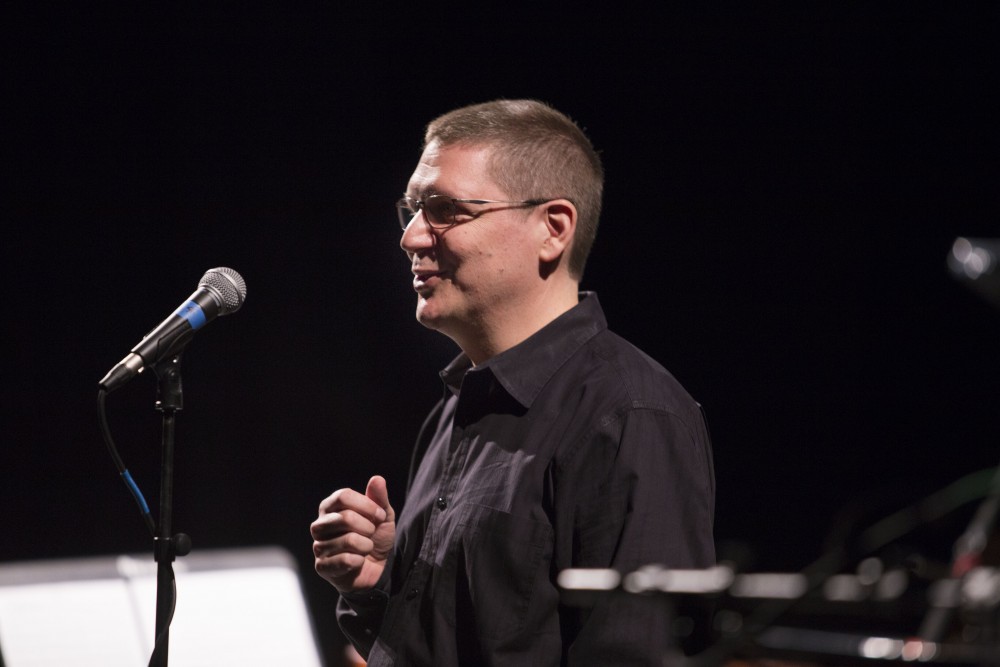 GVL / Sara Carte - Music Director Bill Ryan speaks at the GVSU New Music Ensemble 10th Anniversary Concert to begin at the Peter Martin Wege Theatre in Grand Rapids on Saturday, Apr. 2, 2016.