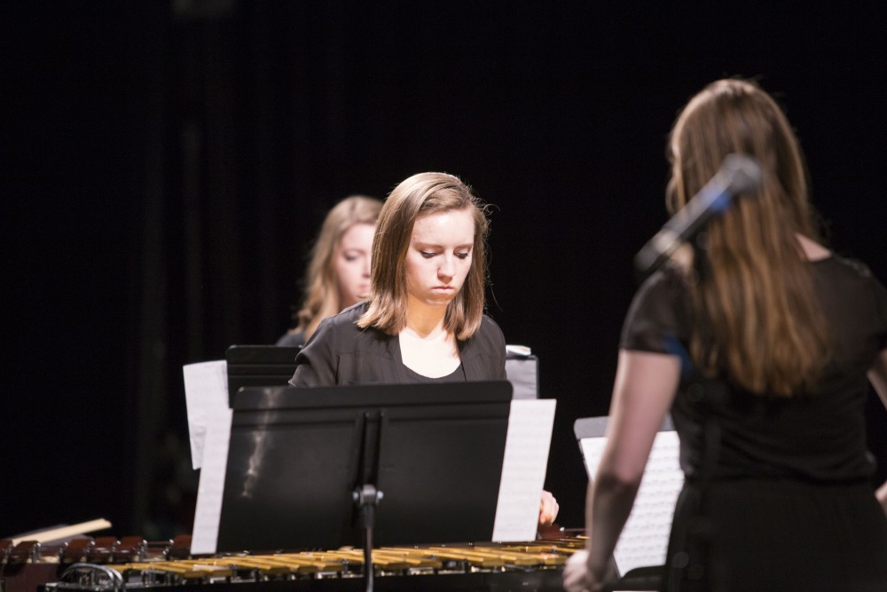 GVL / Sara Carte - Mackenzie Mattis performs at the GVSU New Music Ensemble 10th Anniversary Concert to begin at the Peter Martin Wege Theatre in Grand Rapids on Saturday, Apr. 2, 2016.