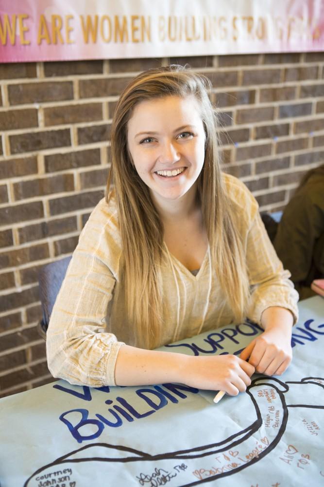 GVL / Sara Carte - Gamma Phi Beta member, Jane Ulrey, takes donations for the Gamma Phive K run in the Kirkhof center on Monday, Apr. 11, 2016.