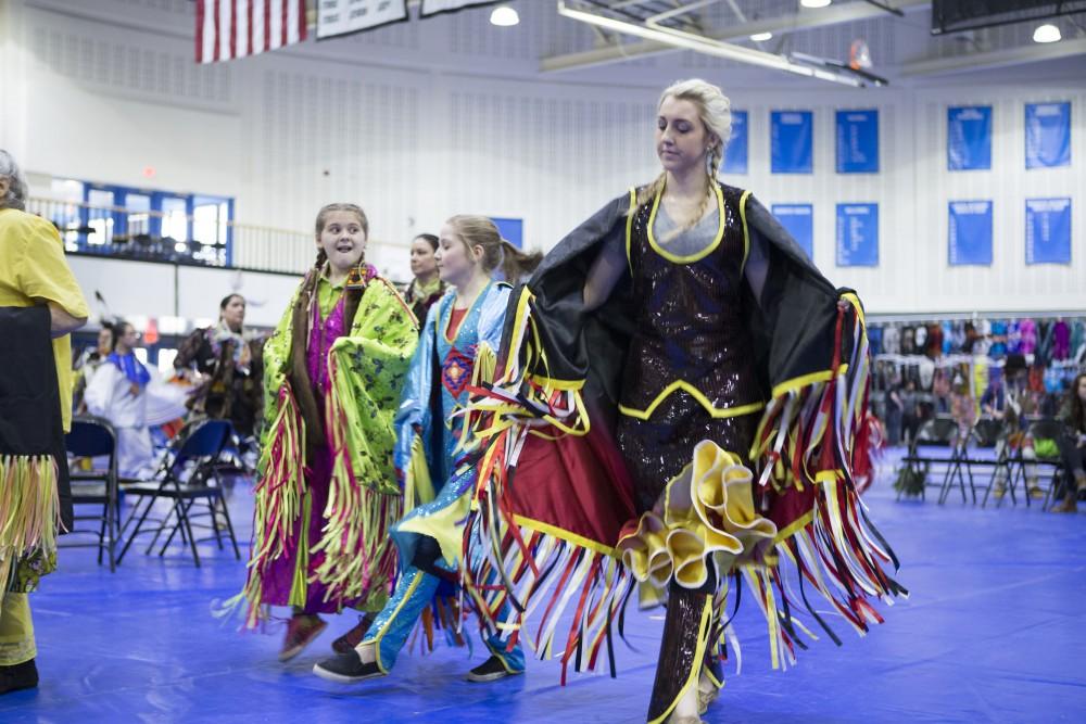 GVL / Sara Carte - Native American dancers dance in the Native American Pow-Wow in the Fieldhouse on Saturday, Apr. 9, 2016.