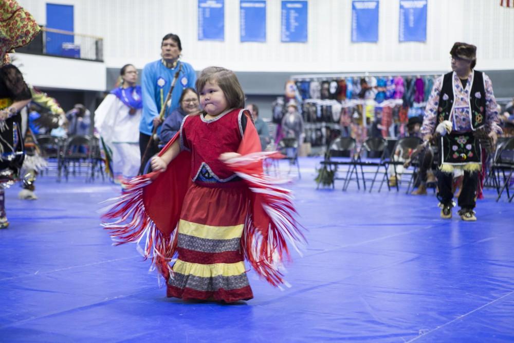 GVL / Sara Carte - Native American dancers dance in the Native American Pow-Wow in the Fieldhouse on Saturday, Apr. 9, 2016.