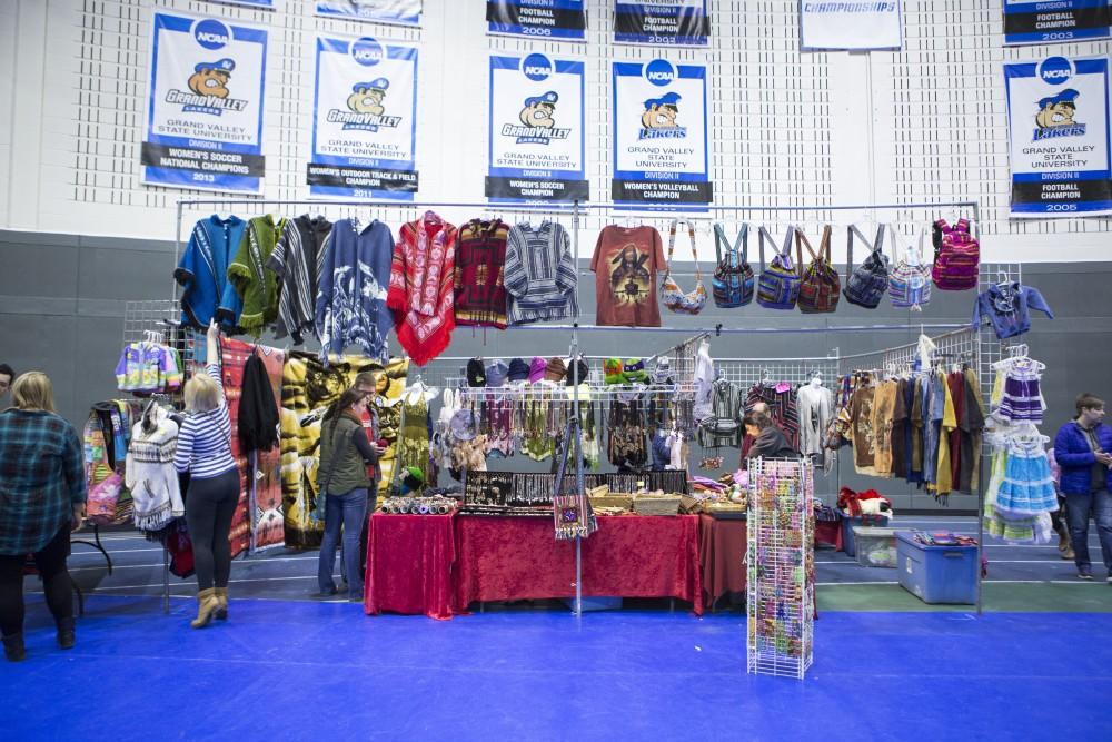 GVL / Sara Carte - Vendors sell specialized items at the Native American Pow-Wow in the Fieldhouse on Saturday, Apr. 9, 2016.