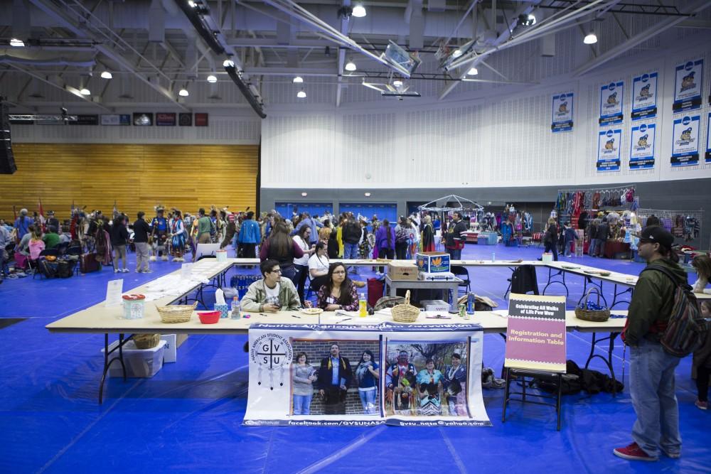 GVL / Sara Carte - Vendors sell specialized items at the Native American Pow-Wow in the Fieldhouse on Saturday, Apr. 9, 2016.