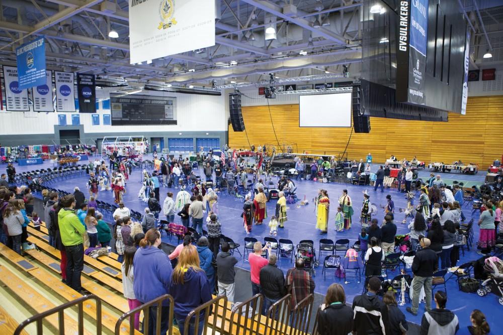 GVL / Sara Carte - Native American dancers dance in the Native American Pow-Wow in the Fieldhouse on Saturday, Apr. 9, 2016.