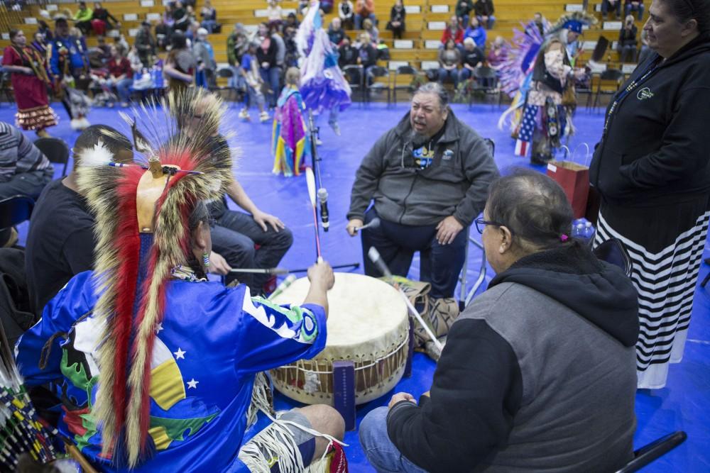 GVL / Sara Carte - Native American drummers drum in the Native American Pow-Wow in the Fieldhouse on Saturday, Apr. 9, 2016.