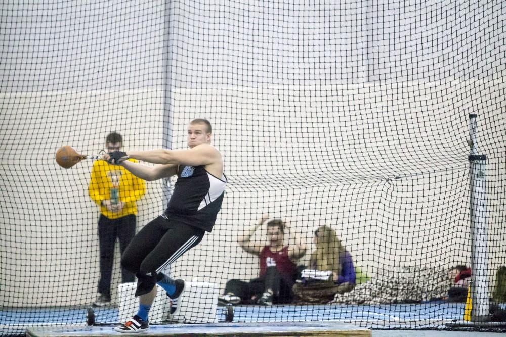GVL / Sara Carte
Grand Valley Track and Field thrower, Mike Prestigiacomo, throws shot put during the GVSU Mike Lints Alumni Open Meet in the Kelly Family Sports Center on Saturday, Jan. 30, 2016.