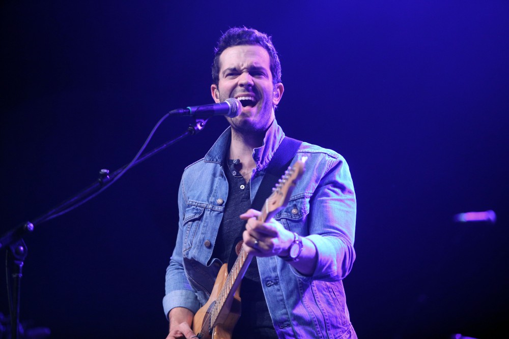 GVL / Emily Frye 
Warner Nashville Music artist Ryan Kinder hits the stage at Grand Valley State University on Thursday April 7, 2016. 