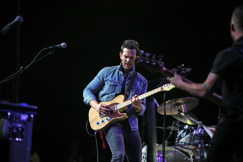 GVL / Emily Frye 
Warner Nashville Music artist Ryan Kinder hits the stage at Grand Valley State University on Thursday April 7, 2016. 