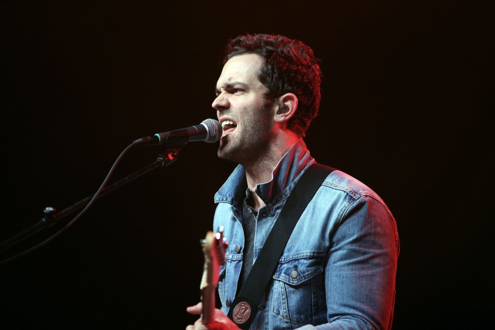 GVL / Emily Frye 
Warner Nashville Music artist Ryan Kinder hits the stage at Grand Valley State University on Thursday April 7, 2016. 