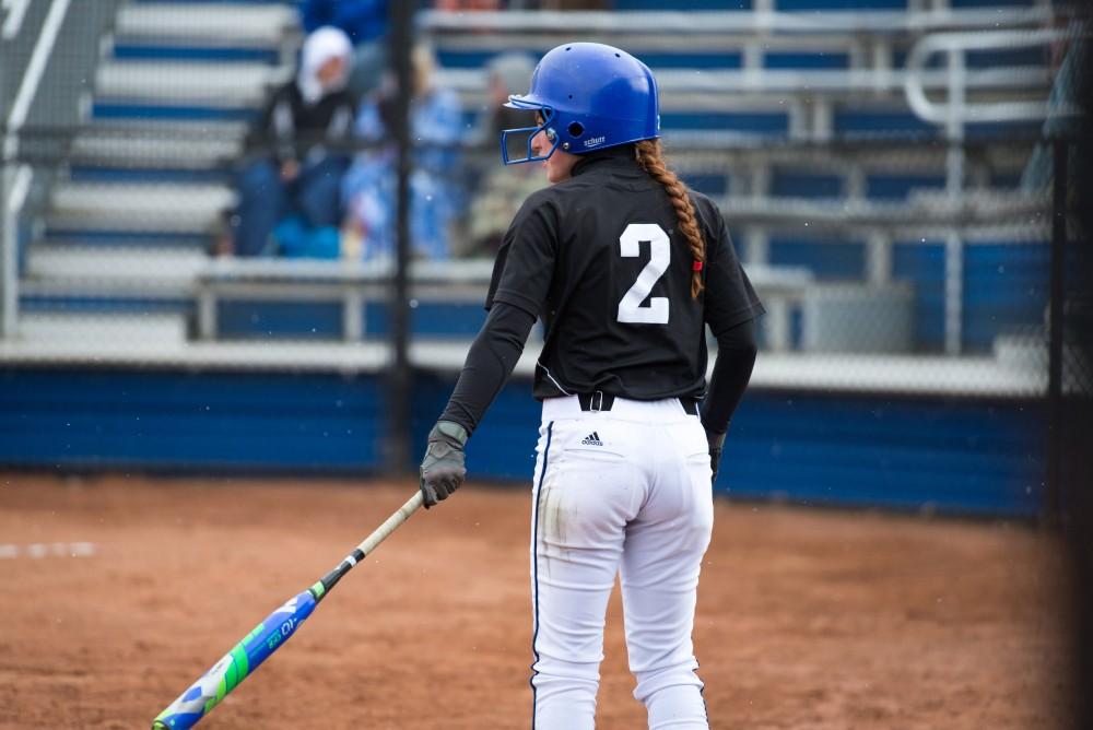 GVL / Luke Holmes - Ellie Balbach (11) makes contact with the ball. Grand Valley Women's Softball won 9-5 in their first game against Lake Superior State.