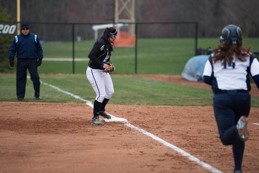 GVL / Luke Holmes - McKenze Supernaw (3) makes contact with the ball. Grand Valley Women's Softball won 9-5 in their first game against Lake Superior State.